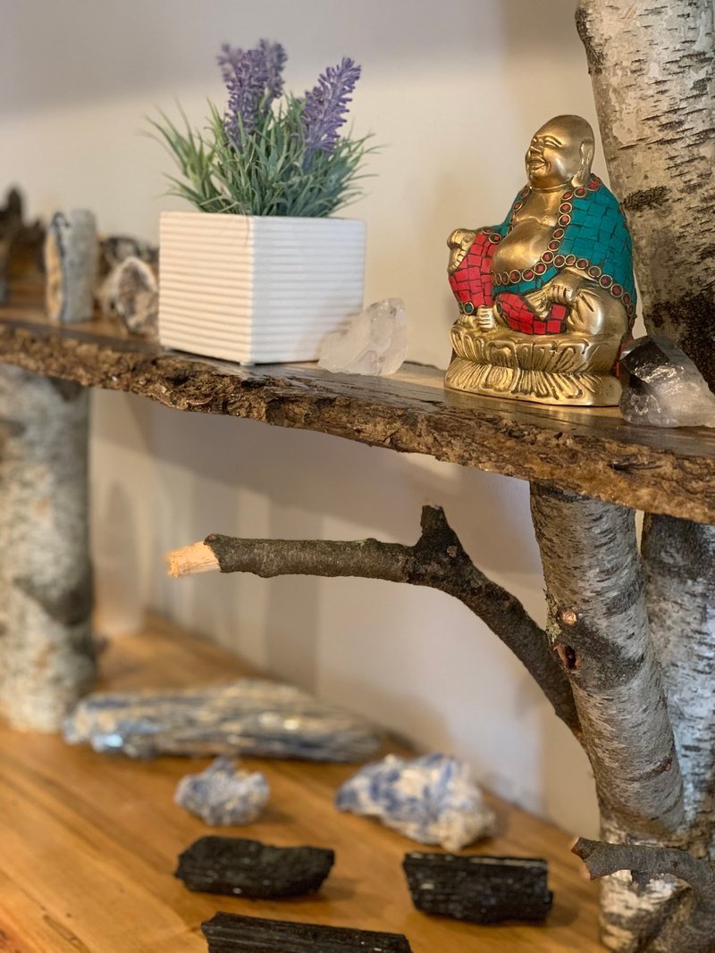 Display of polished crystal specimens, geodes, and mineral towers