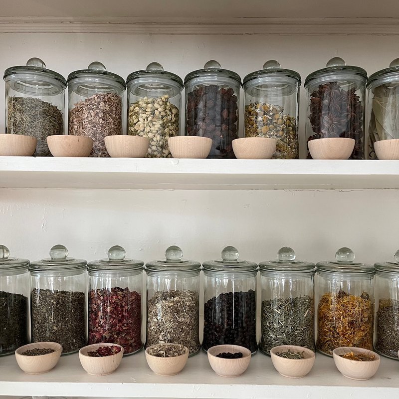 Shop interior featuring gemstones, healing crystals, and spiritual products