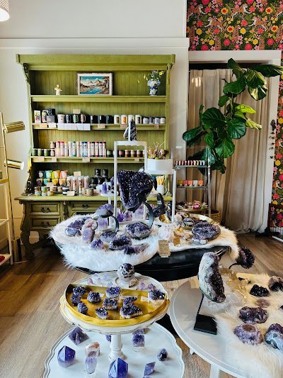 Shop interior featuring gemstones, healing crystals, and spiritual products