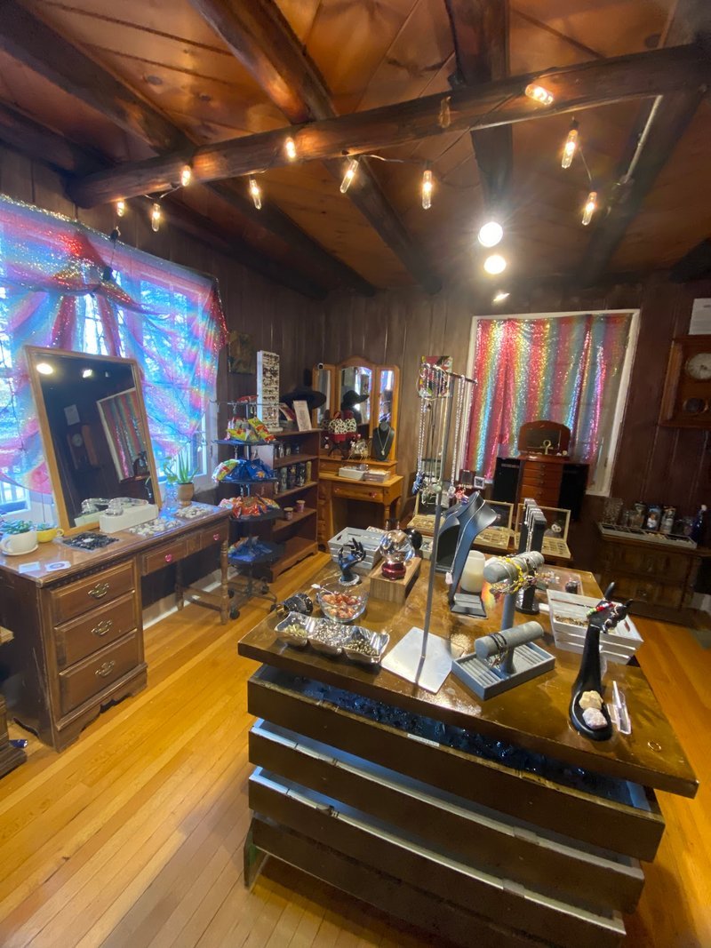 Display of polished crystal specimens, geodes, and mineral towers