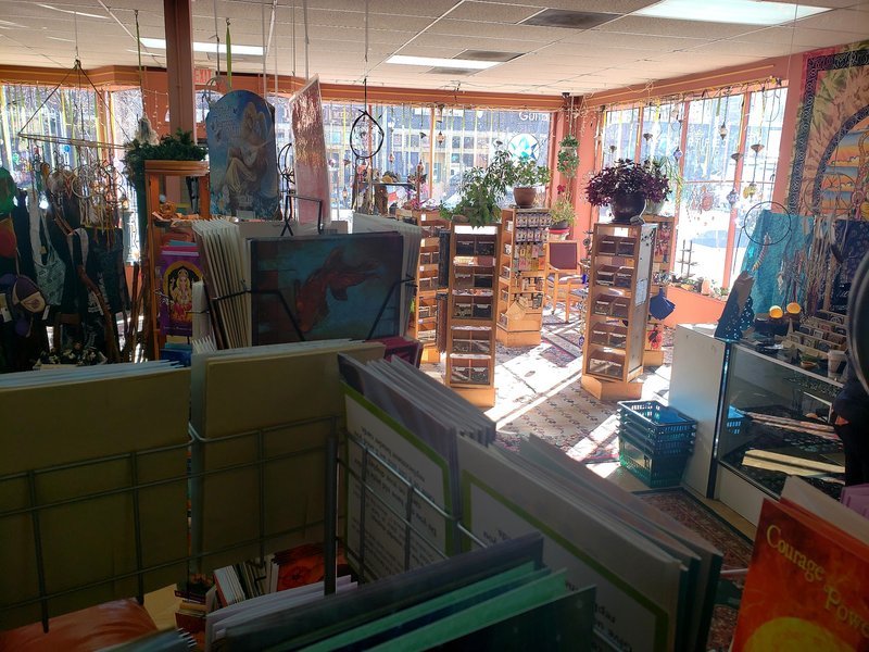 Selection of healing crystals, tumbled stones, and decorative mineral pieces