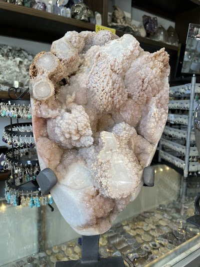 Interior view showcasing crystal towers, spheres, and carved stone pieces