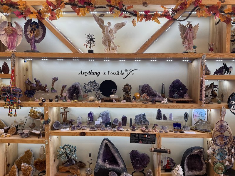 Interior view showcasing crystal towers, spheres, and carved stone pieces