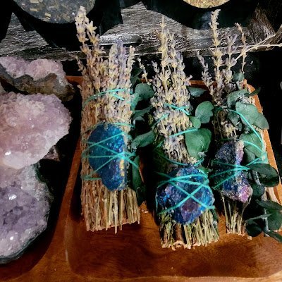 Shop interior featuring gemstones, healing crystals, and spiritual products