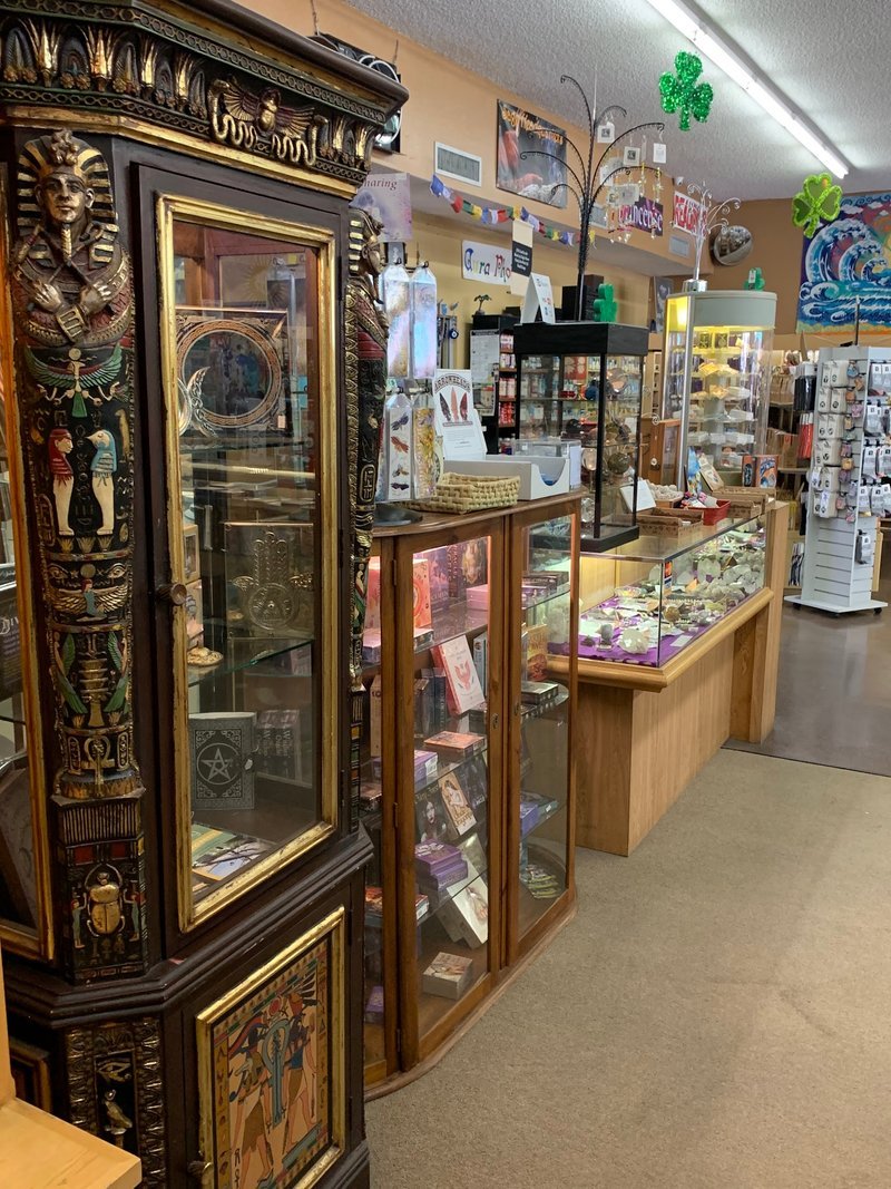 Display of polished crystal specimens, geodes, and mineral towers