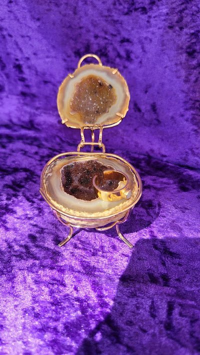 Retail display with tumbled stones, raw crystals, and polished specimens