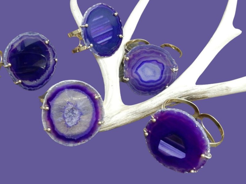 Crystal and mineral specimens including quartz, amethyst, and calcite varieties