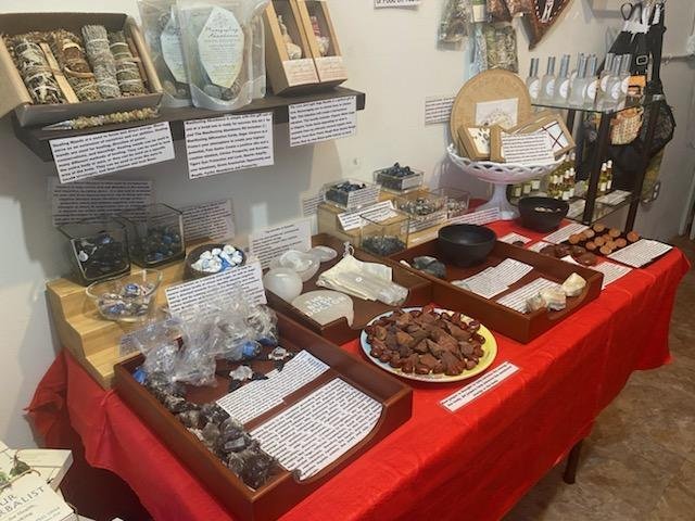 Display of polished crystal specimens, geodes, and mineral towers