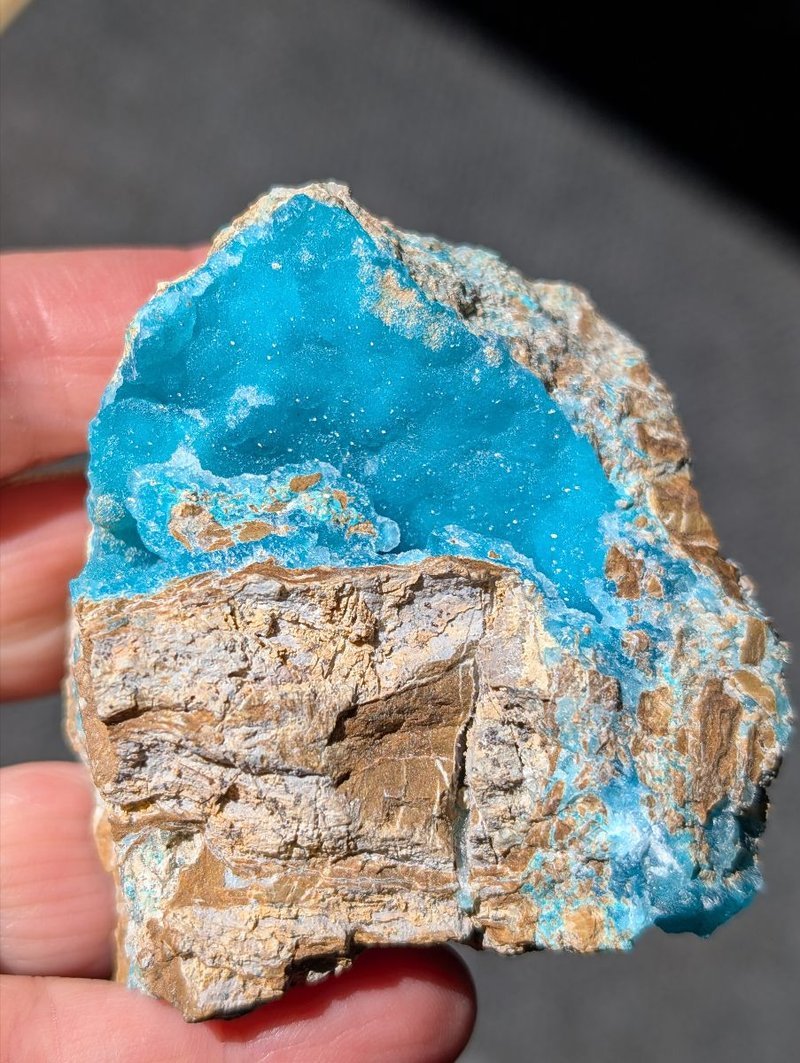 Crystal and mineral specimens including quartz, amethyst, and calcite varieties