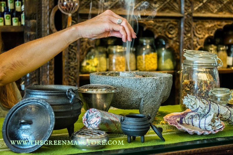 Shop interior featuring gemstones, healing crystals, and spiritual products