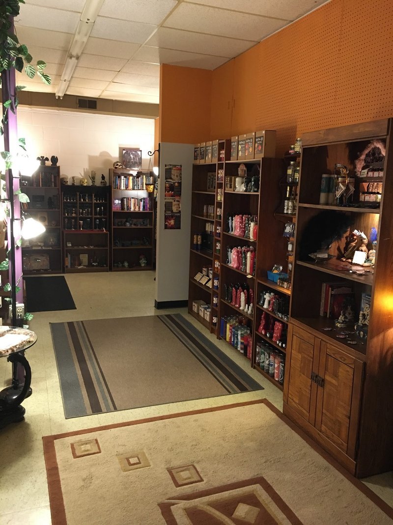 Organized crystal display with labeled stones and healing minerals