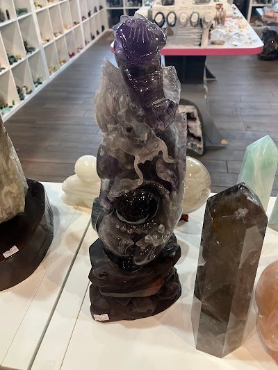 Collection of raw crystals, polished stones, and unique mineral formations