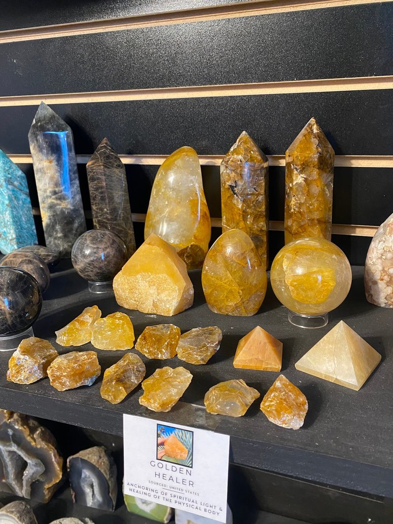 Interior view showcasing crystal towers, spheres, and carved stone pieces