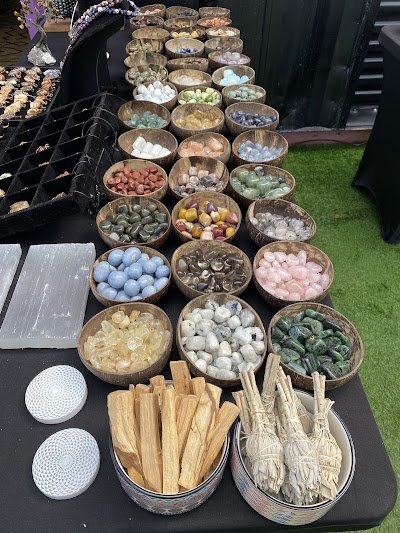 Selection of healing crystals, tumbled stones, and decorative mineral pieces