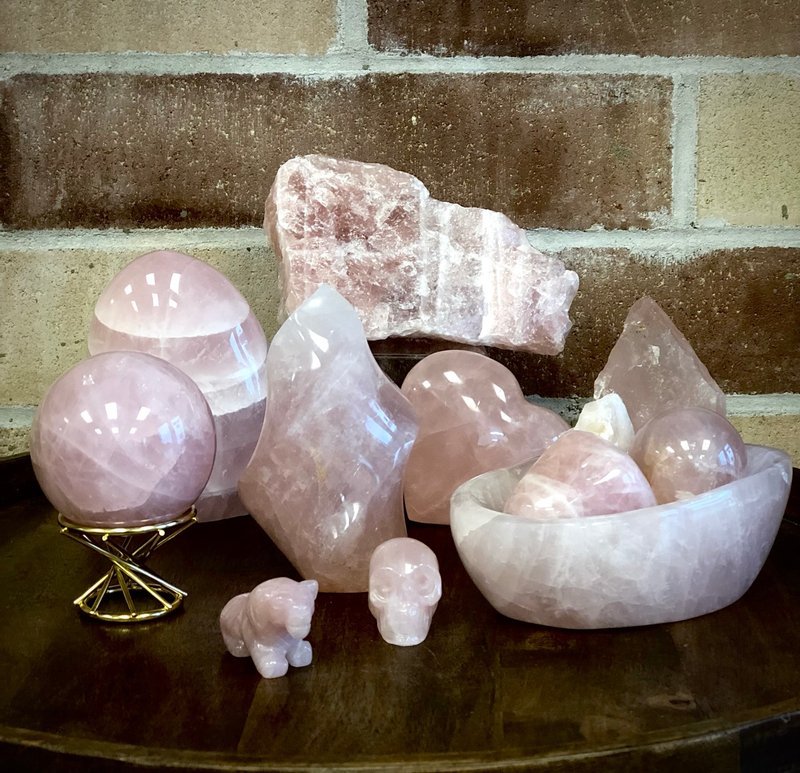 Crystal and mineral specimens including quartz, amethyst, and calcite varieties