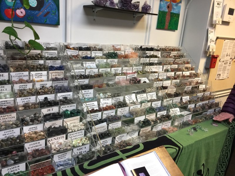 Shop interior featuring gemstones, healing crystals, and spiritual products