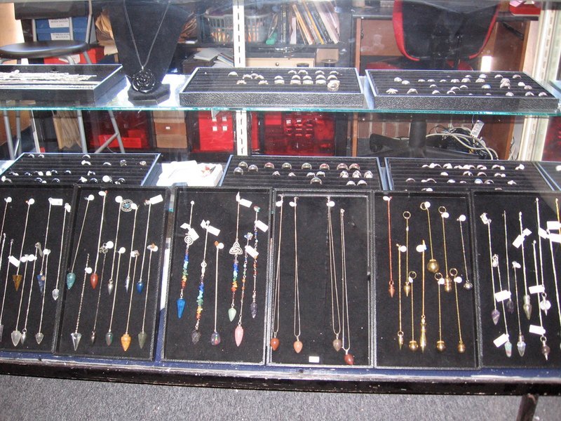Display of polished crystal specimens, geodes, and mineral towers