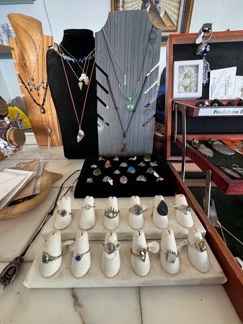 Organized crystal display with labeled stones and healing minerals