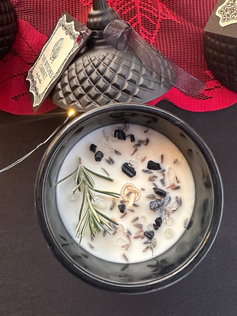 Display featuring crystal points, polished stones, and raw mineral specimens