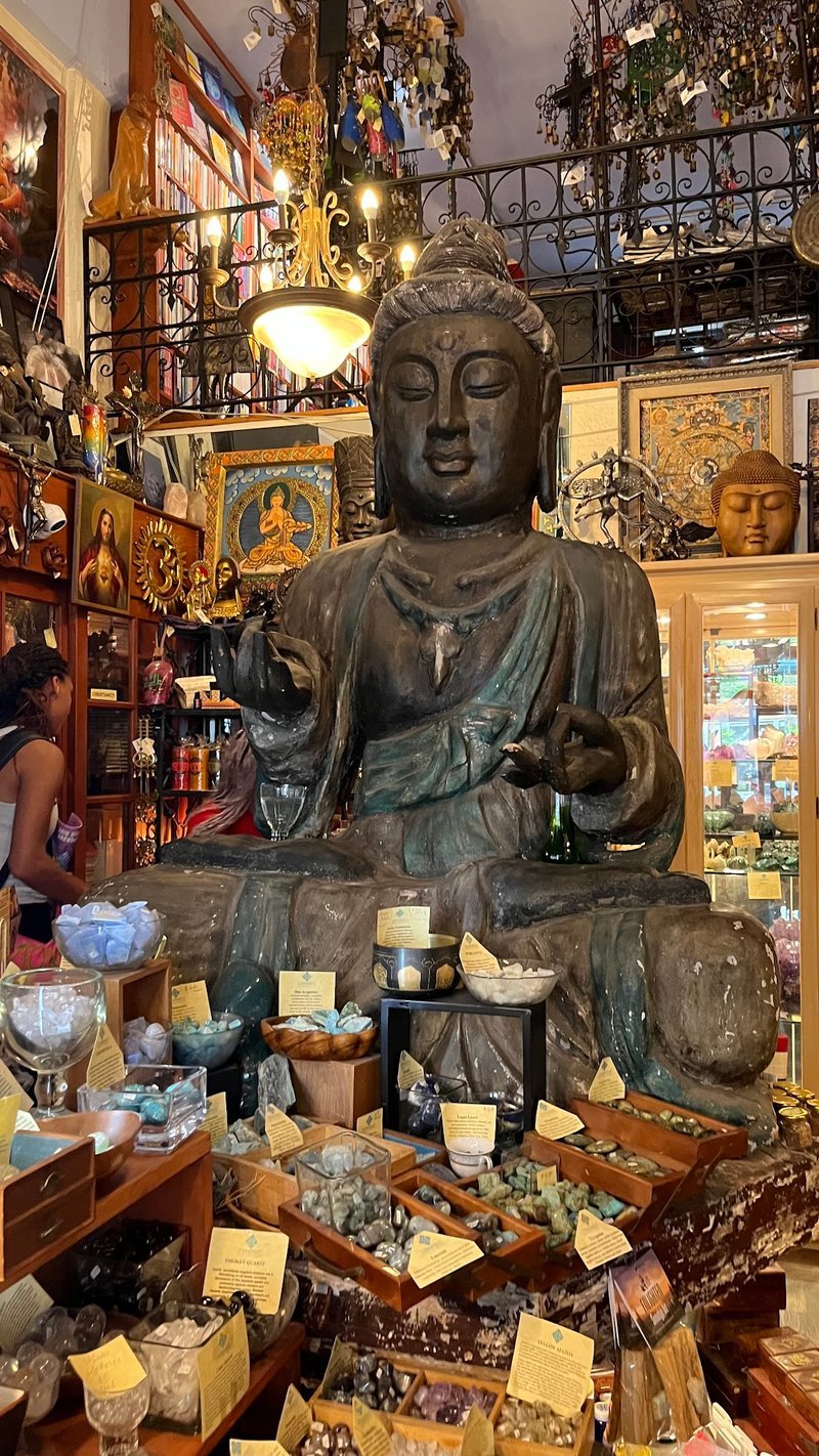 Selection of healing crystals, tumbled stones, and decorative mineral pieces