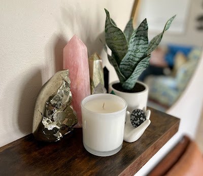 Selection of healing crystals, tumbled stones, and decorative mineral pieces