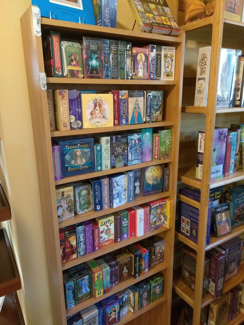 Organized crystal display with labeled stones and healing minerals