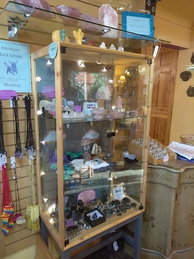 Crystal and mineral specimens including quartz, amethyst, and calcite varieties