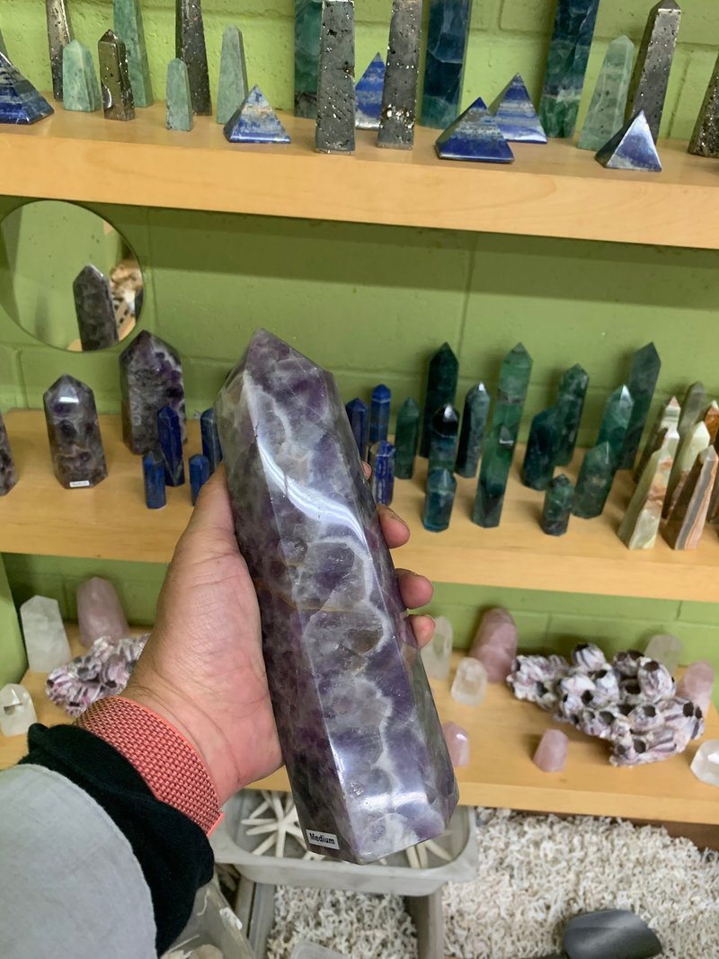 Store interior displaying crystals, minerals, and metaphysical supplies