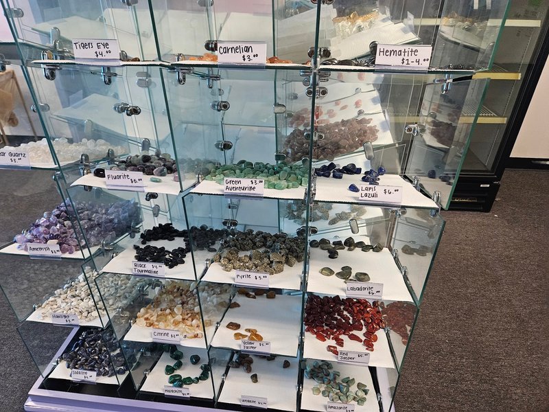 Interior view showcasing crystal towers, spheres, and carved stone pieces