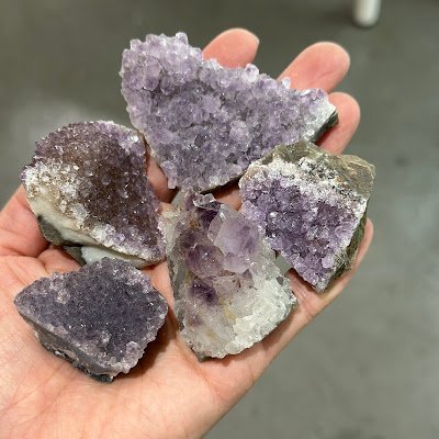 Shop interior featuring gemstones, healing crystals, and spiritual products